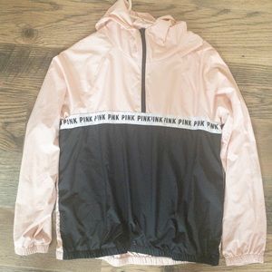 Pink and black windbreaker sweater